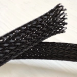 DAXX Кожух для кабелей диаметром от 9 до 15мм нейлоновый, черный -1м-