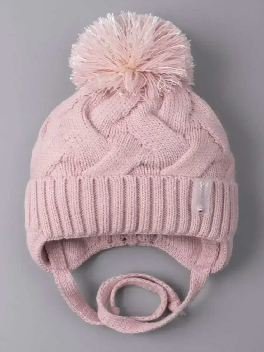 Шапка для девочки на завязках на осень