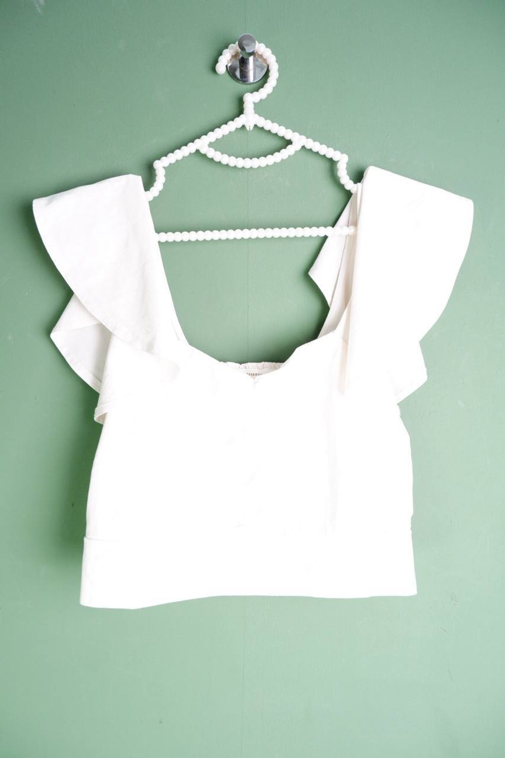 Топ Reserved для романтичного акцента, маркировка L, визуально на 48 размер