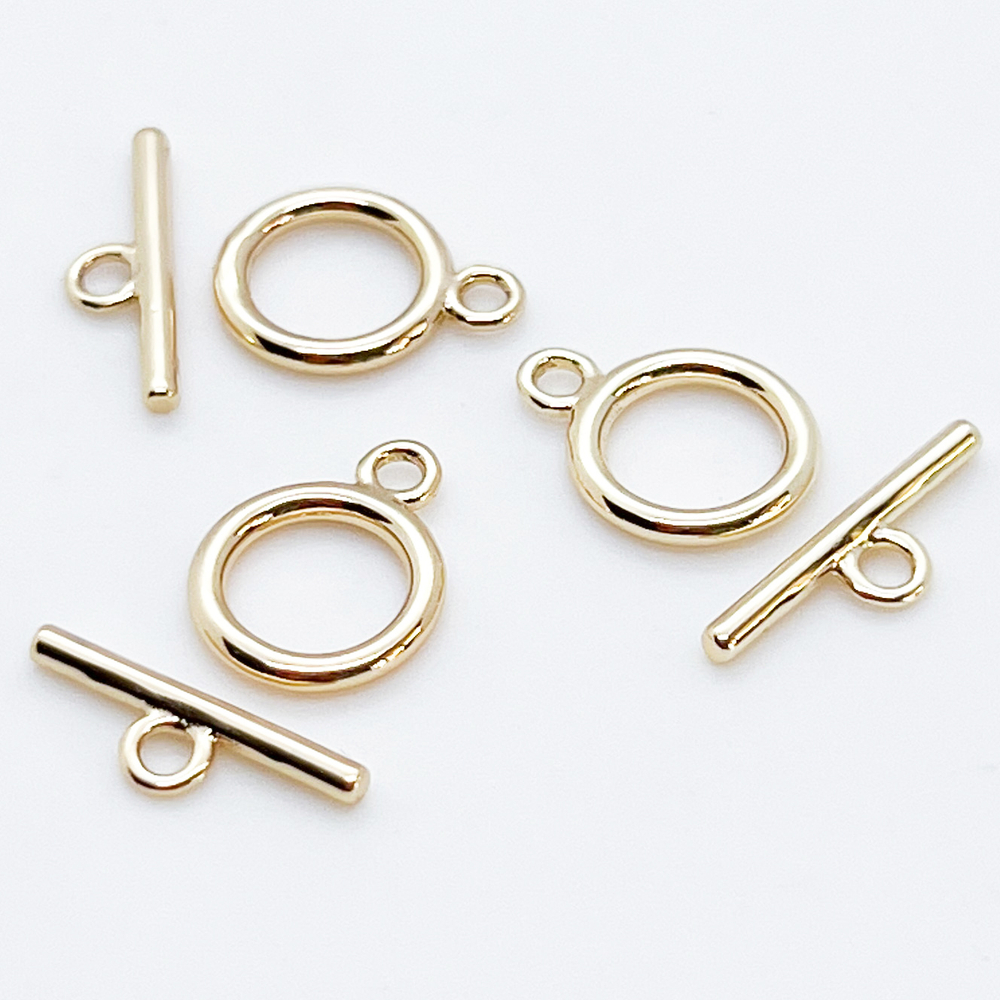 Замок-тоггл, цвет золото, размер 11*9 мм, цена за 1 шт