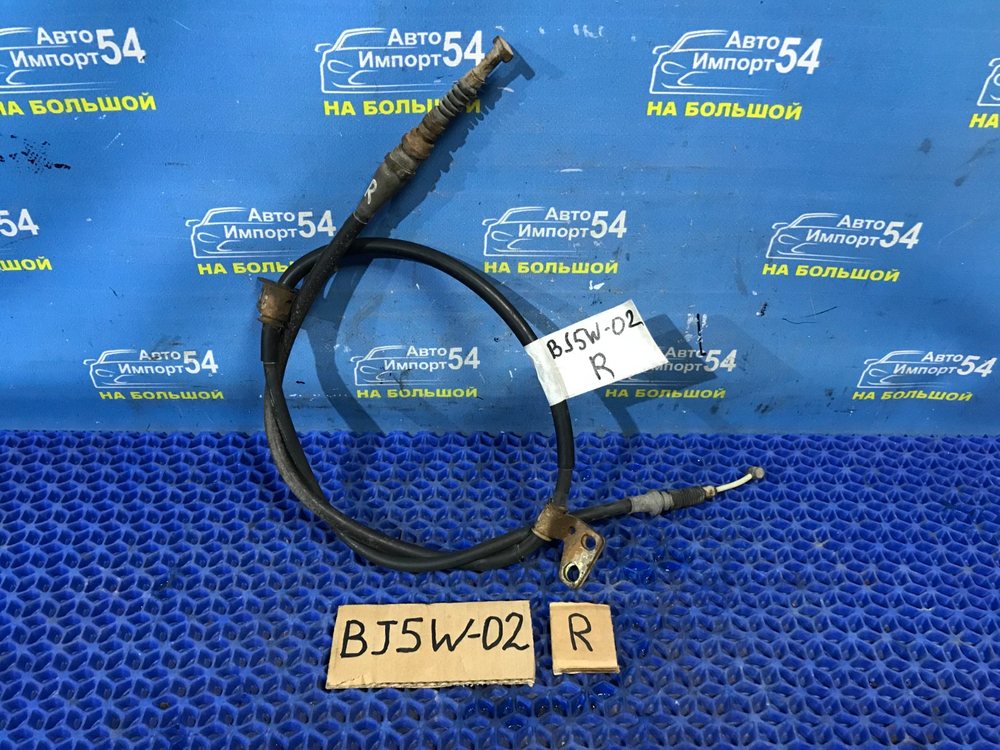 Трос ручника правый MAZDA FAMILIA 2001