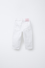 Джинсы mom fit с разрезами