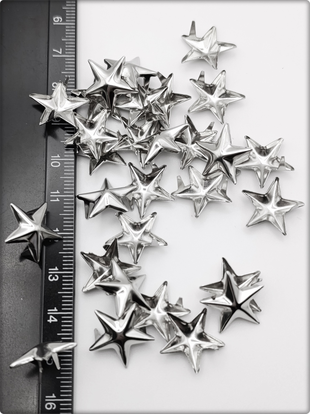 Клепки "Звёзды" серебристые с цапами для декора.