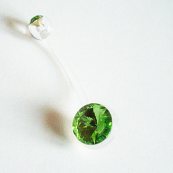 Для пирсинга пупка ( длина 20 мм) с Зелеными кристаллами. Материал биофлекс ( для беременных)
