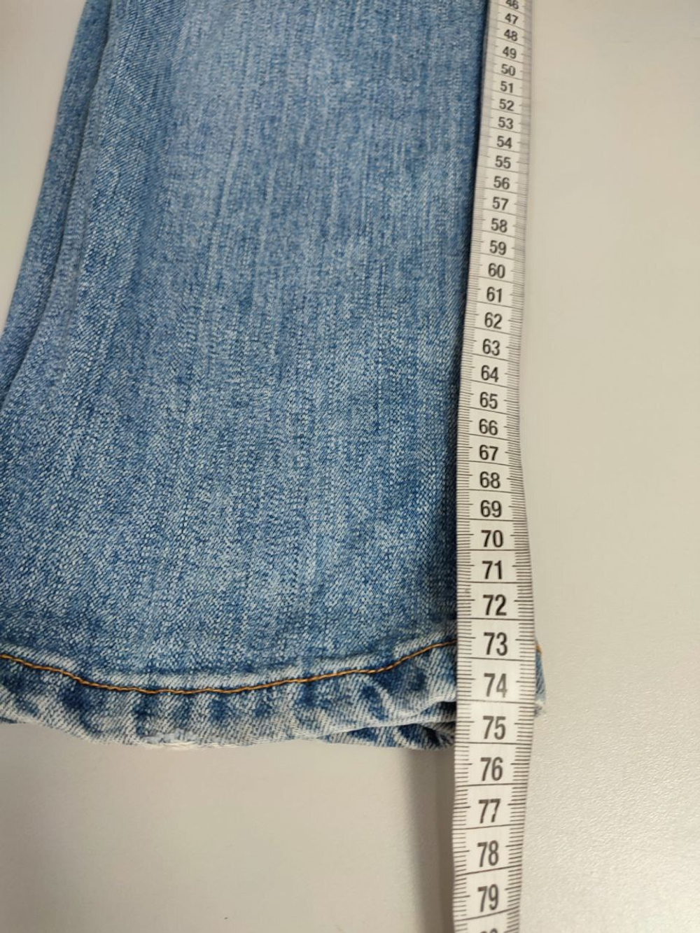 Джинсы  светлые 44 размер