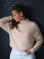 Описание по вязанию свитера спицами "Sefkat"