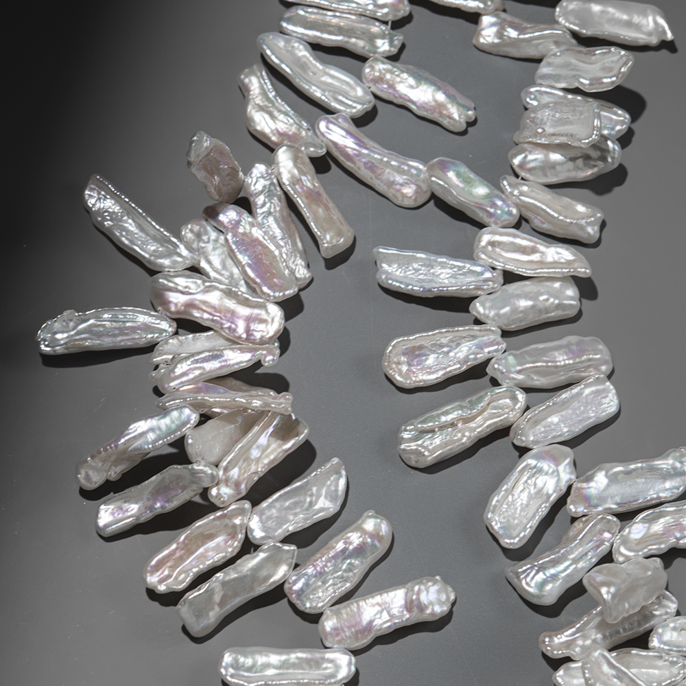 Жемчуг культивированный Бива, белый, с боковым отверстием 19-30*9-10мм