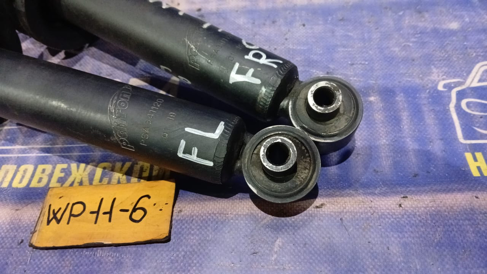 Стойка передняя правая NISSAN PRIMERA 1997