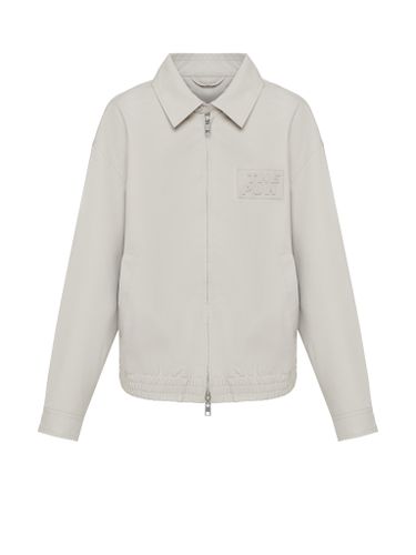 Светло-серый хлопковый бомбер с лого на груди