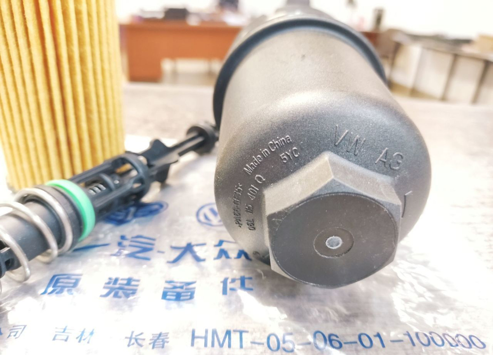 Корпус масляного фильтра со штоком VAG