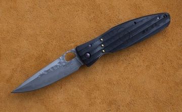 Складной нож Mcusta Oda Nobunaga SPG2 blade black mikarta handle MC-0181G c клинком из стали SPG2 San Mai, рукоять микарта