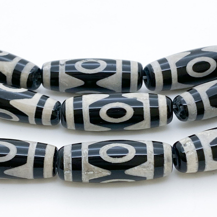 "Дзи" 3 Глаза, размер около 30*10 мм, цена за 1 шт