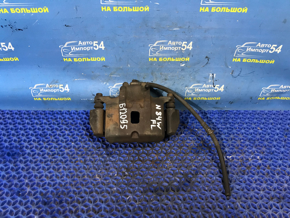 Суппорт тормозной передний левый MITSUBISHI CHARIOT GRANDIS 1997-2003