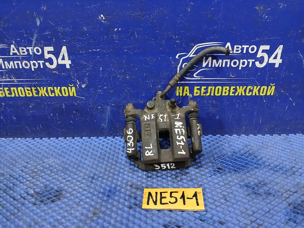 Суппорт тормозной задний левый NISSAN ELGRAND 2005