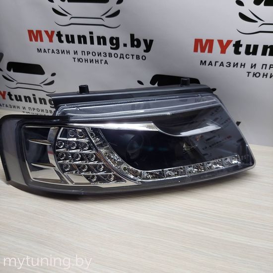 Передние фары VW Passat B5 daylight black