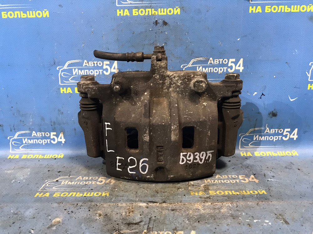 Суппорт тормозной передний левый NISSAN CARAVAN 2012-2017