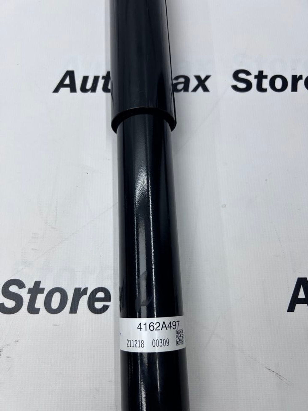 Амортизатор задний Митсубиши Паджеро 3. 4162A497. Новый. Оригинал.