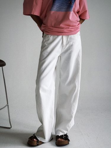 Широкие светло-серые джинсы с защипами