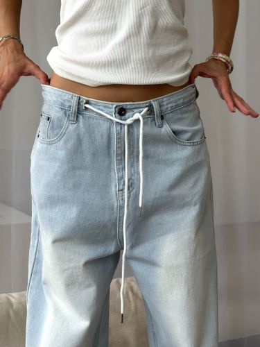 Светло-голубые джинсы-трансформеры на кулиске