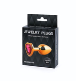 Золотистая анальная пробка с малиновым кристаллом-сердечком - 7 см. (Цвет: малиновый)