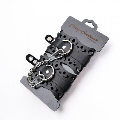 Наручники из черной кожи с узорами