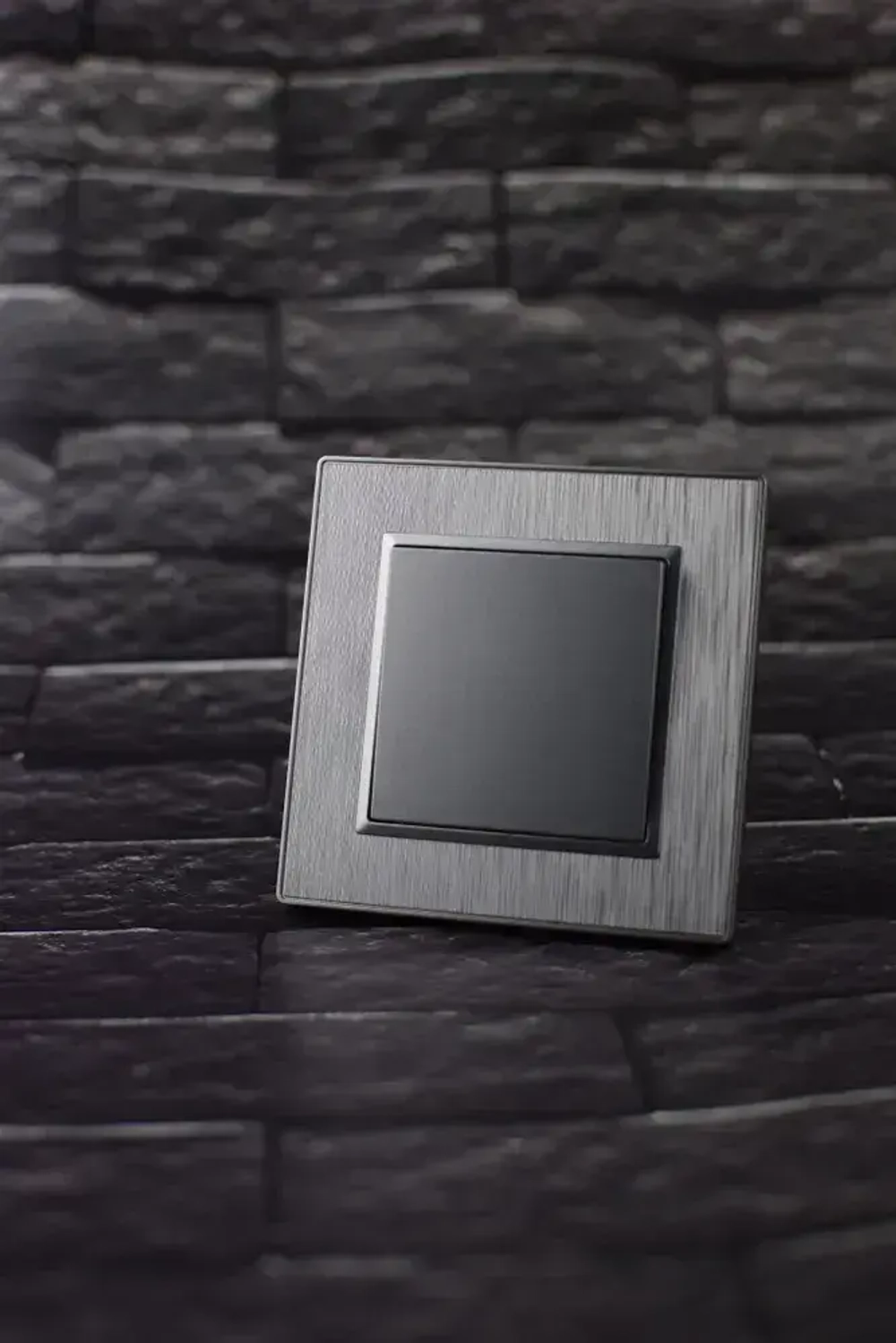 Выключатель одноклавишный серый