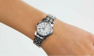 Tissot T033.210.11.013.00 женские часы T Classic на браслете