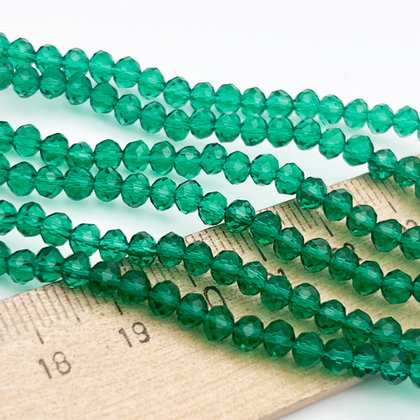 Бусины рондель с огранкой, стекло, цвет изумрудный, размер около 3,8*4,4 мм, цена за нить 106 шт