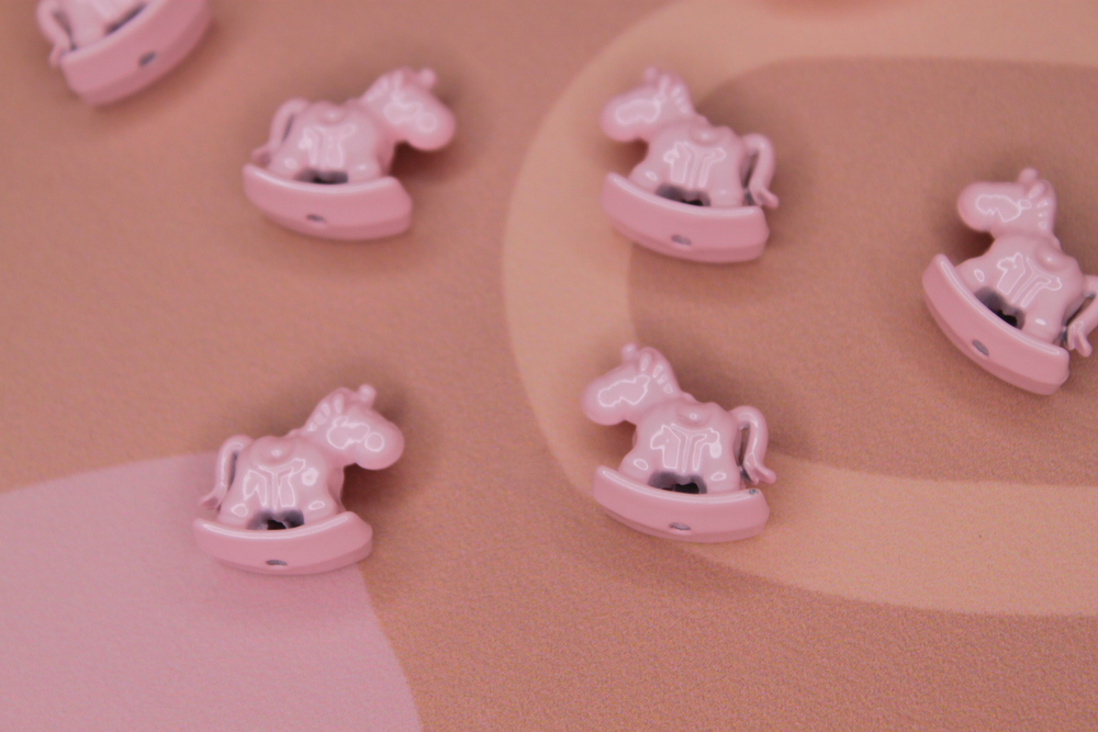 Бусина лошадка 14х8 мм розовая