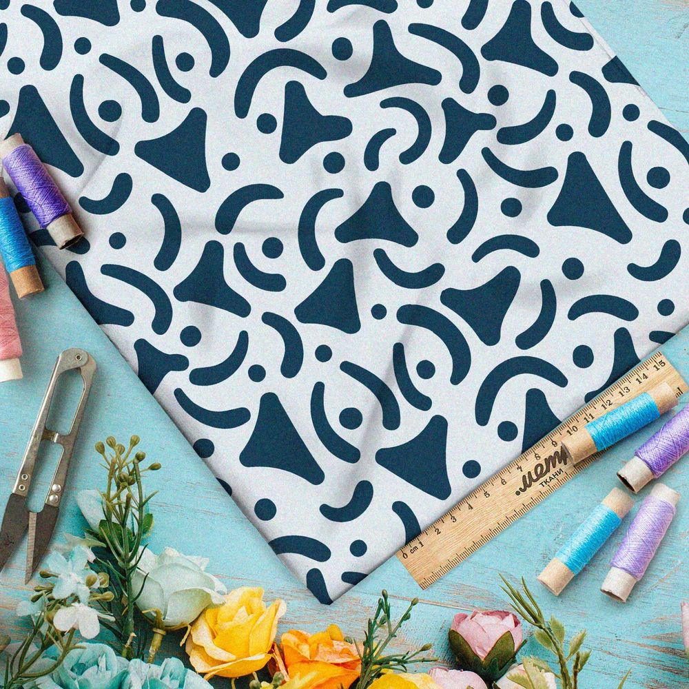 Ткань штапель синие треугольные узоры на голубом фоне