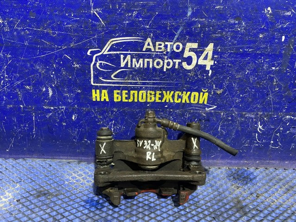 Суппорт тормозной задний левый TOYOTA CAMRY 1993