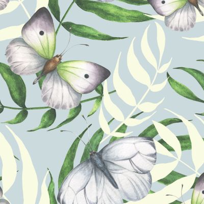 Бабочки на пальмах на голубом