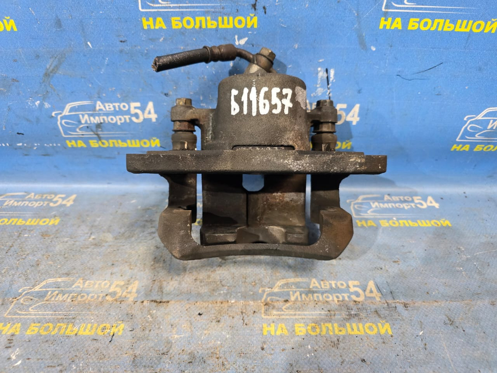 Суппорт тормозной передний левый TOYOTA RAV4 2000-2005