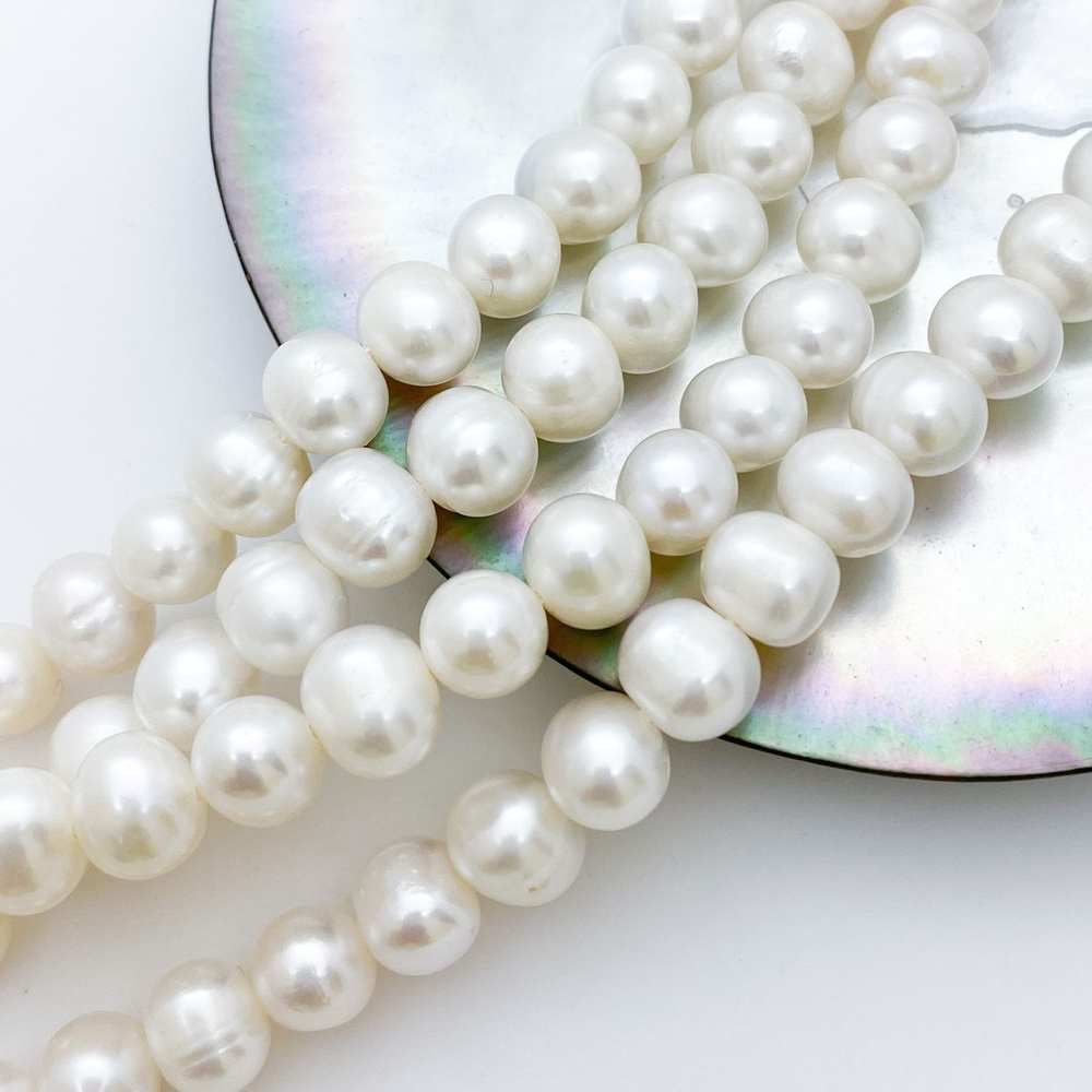 Жемчуг, размер около 6,5*8 мм, цена за 27-28 шт (1/2 нити)