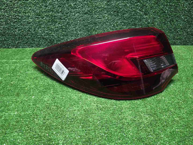 Фонарь левый внешний Opel Astra J (12-18) Седан