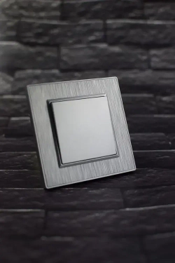 Выключатель одноклавишный серый