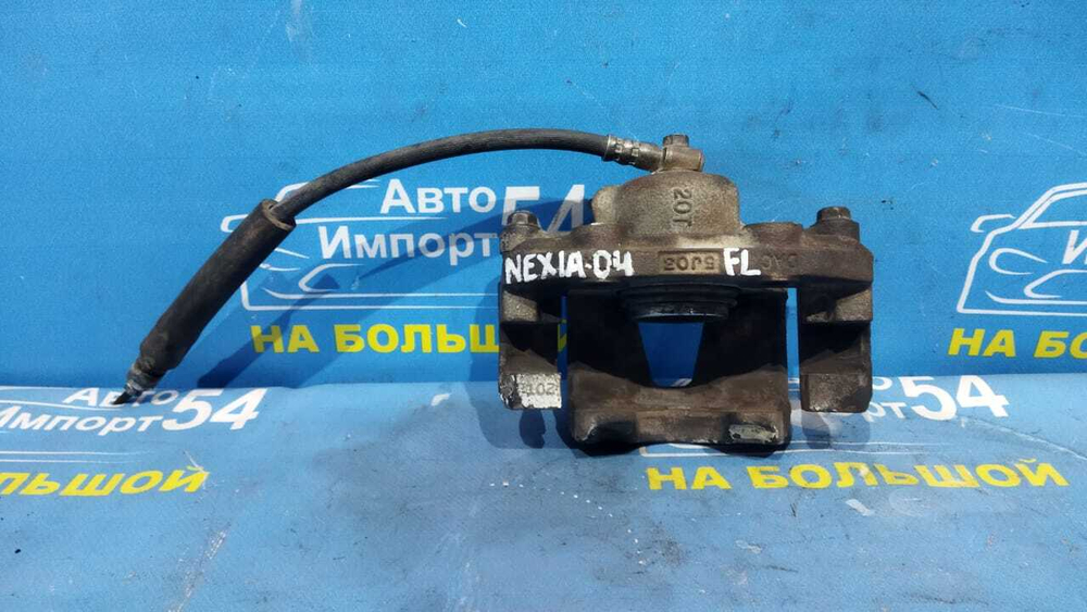 Суппорт тормозной передний левый DAEWOO NEXIA 2001