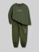 Зеленый костюм для мальчика в школу