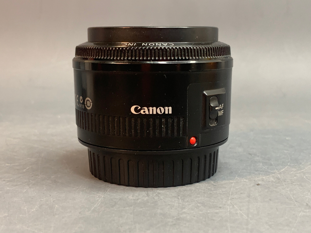 Canon 50mm 1.8 II внутри пылинки