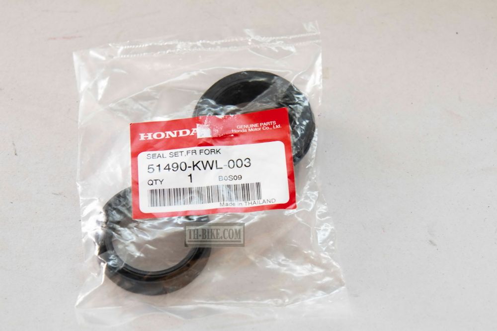 51490-KWL-003. SEAL SET, FR. FORK