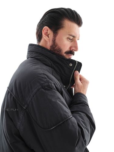 Черный короткий пуховик с напылением