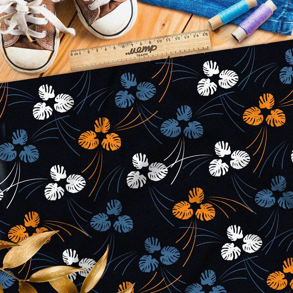 Ткань оксфорд 600 крупные разноцветные листья на чёрном фоне