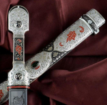 Кинжал кавказский Снежный барс в мельхиоре. Ножны украшаются кавказским орнаментом (чеканка и гравировка)