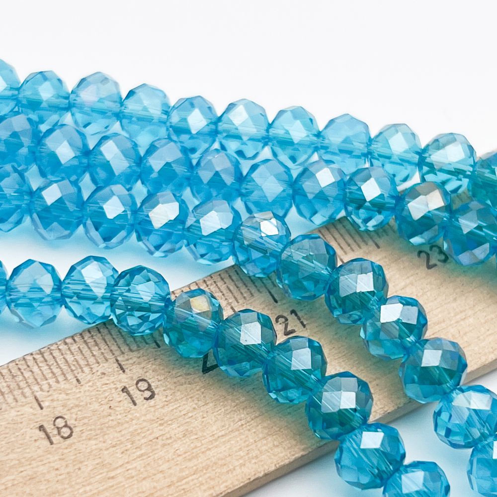 Бусины рондель с огранкой, стекло, цвет голубой, размер около 6,3*7,8 мм, цена за 29-30 шт (1/2 нити)