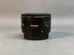 Canon 50mm 1.8 пылинки внутри