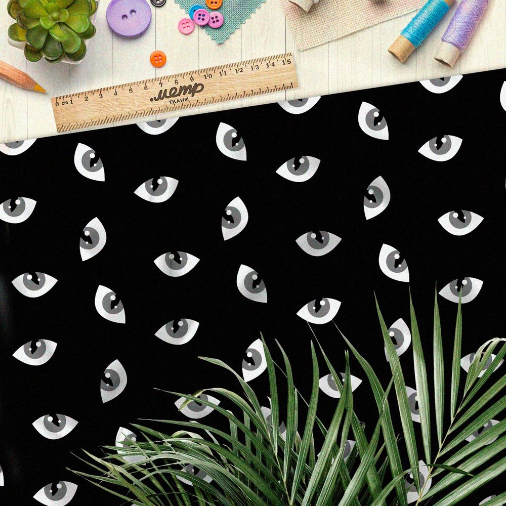 Ткань барби серые кошачьи глаза на чёрном фоне