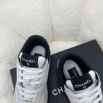 Женские кроссовки Chanel серого цвета с логотипом