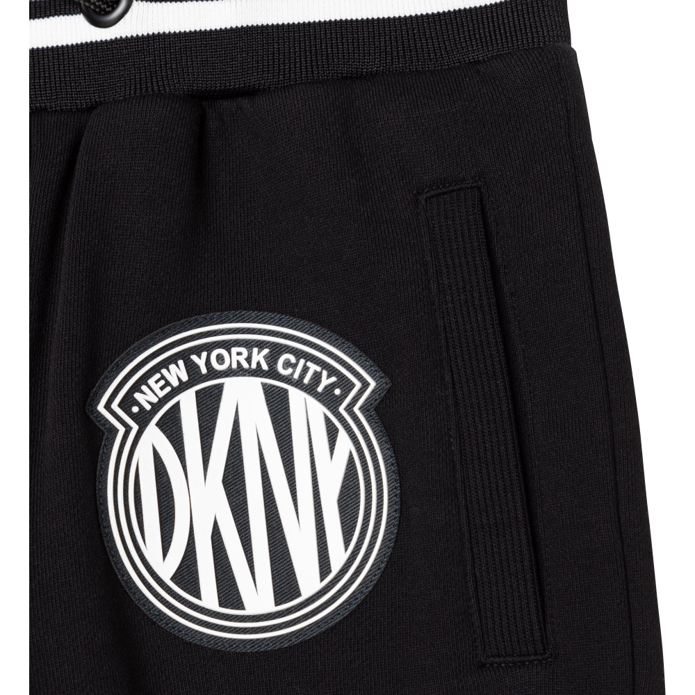 Брюки трикотажные DKNY Черный/Аппликация: черно-белый логотип Девочка