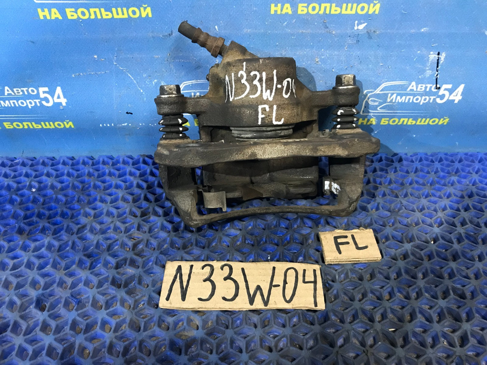 Суппорт тормозной передний левый MITSUBISHI CHARIOT 1994