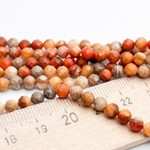 Коралл окаменелый граненый бусины, размер около 4,1-4,2 мм, цена за отрезок 19 см (1/2 нити)